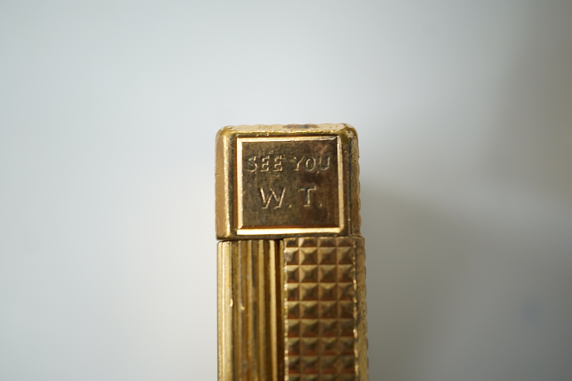 A cased DuPont lighter with booklet and a Dunhill rollagas example